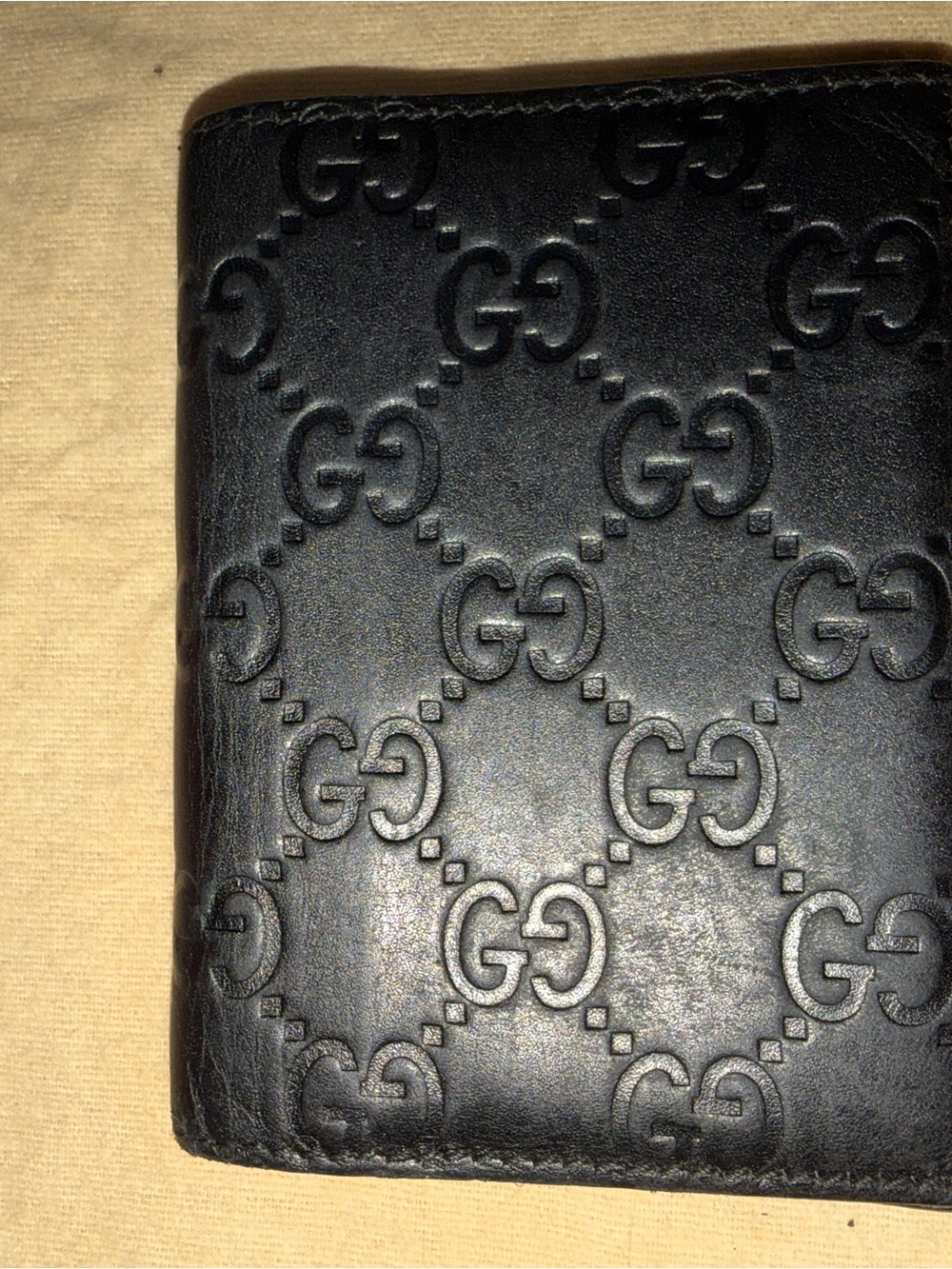 Gucci Embossed Leather Bi-Fold Wallet - Black